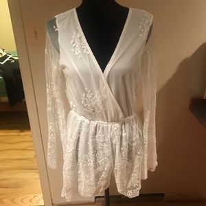 White romper with lace sleeves